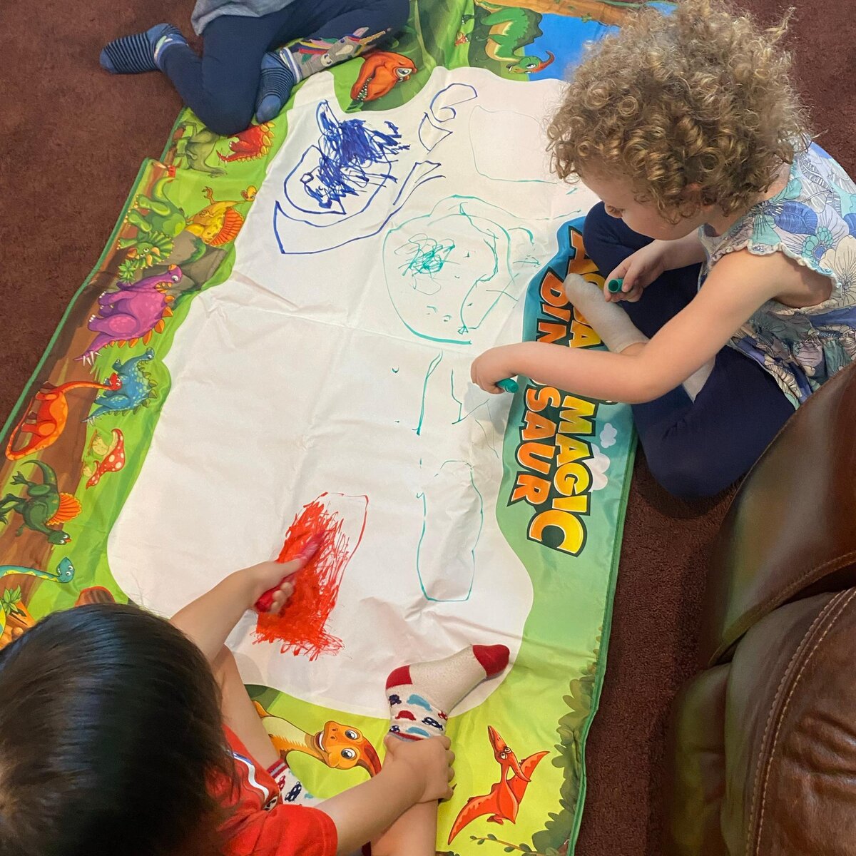 Children doing crafts at Elias Family Child Care
